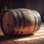 rustic winery stores old whiskey barrels in dark cellar