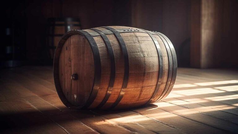 rustic winery stores old whiskey barrels in dark cellar