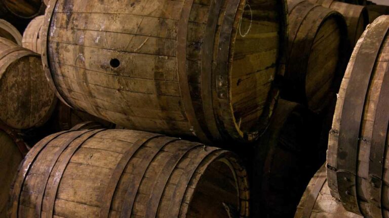 several wooden barrels closeup